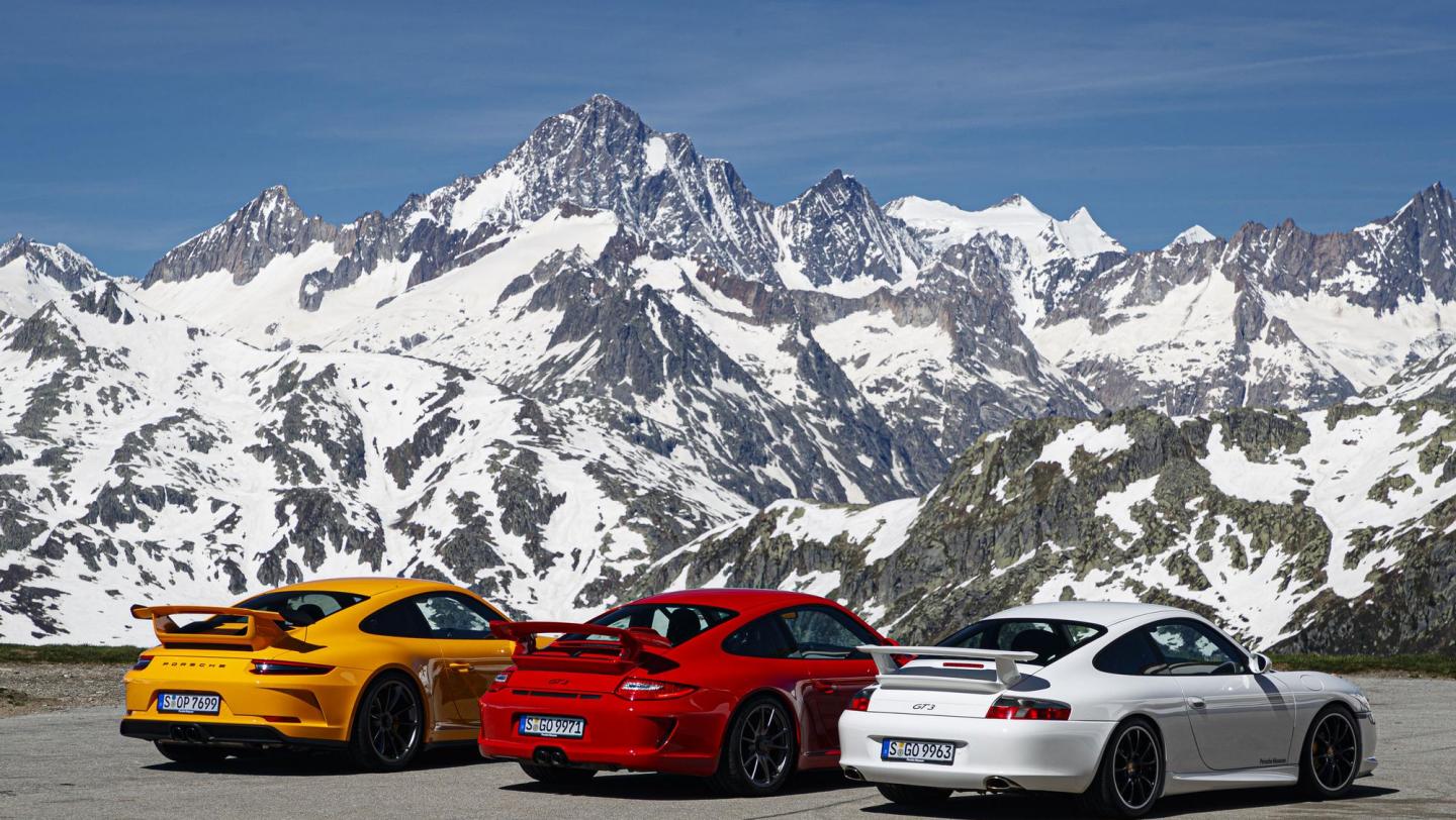 Drei 911 GT3 (996.2, 997.2, 991.2) - racinggelb - indischrot - carraraweissmetallic - Heckflügel - Motorsignet - Schriftzug - Rückleuchten - Schweiz - 2019
